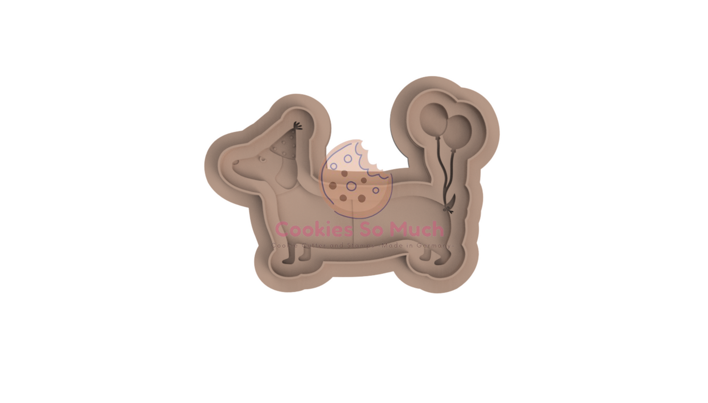 Party dog with sweatshirt debosser and cutter