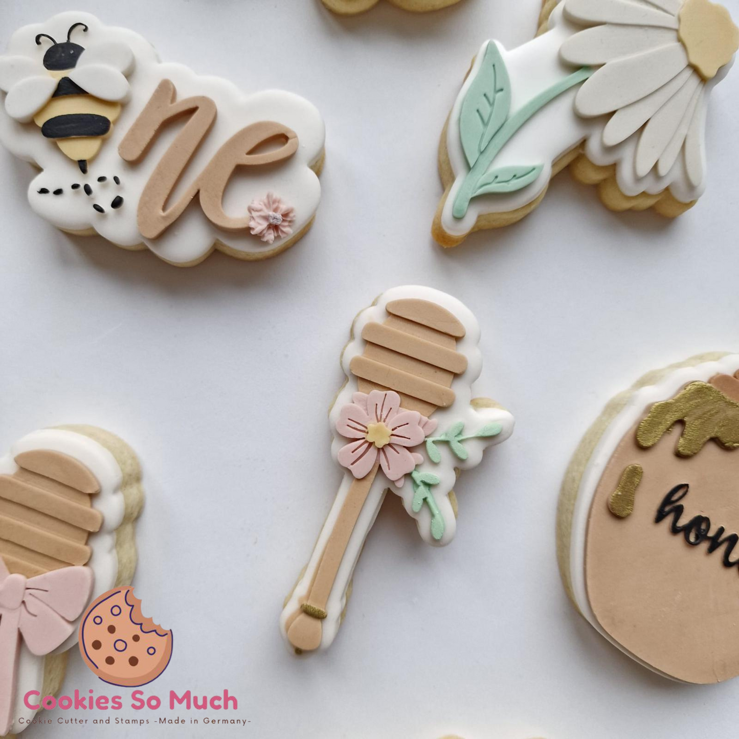 Honiglöffel mit blume debosser und ausstecher