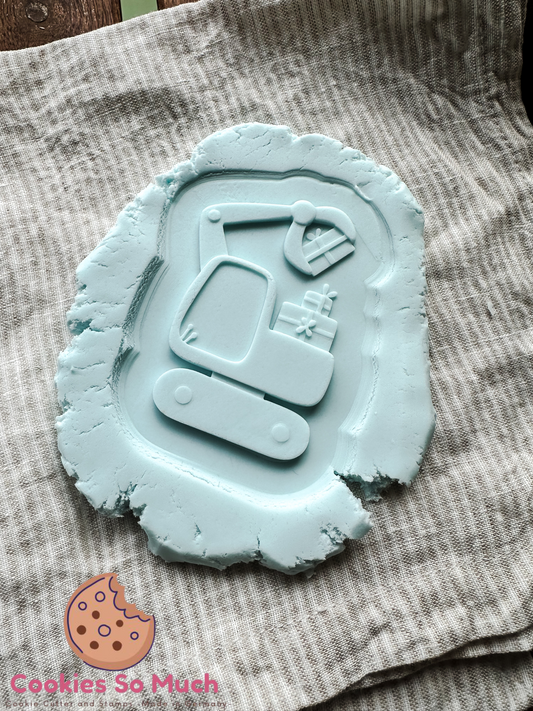 Bagger mit Geschenken debosser und ausstecher